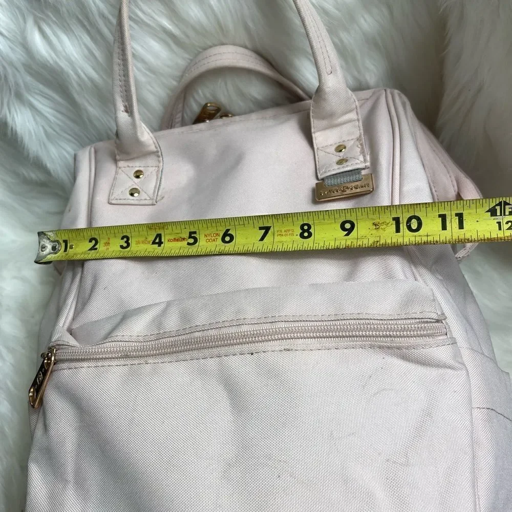 Swiss Gear light pink canvas multi purpose backpack with Rose gold Hardw…